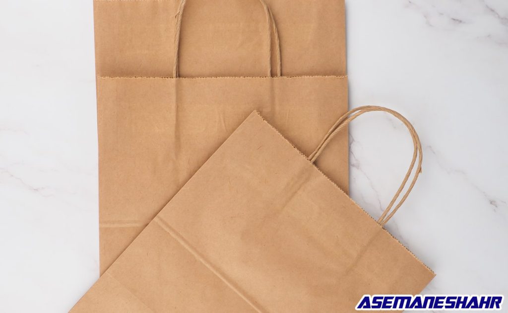 پاکت هدیه کرافت ساده با دسته کاغذی | مناسب بسته‌ بندی هدیه و سوغات به سبک طبیعی و مدرن.