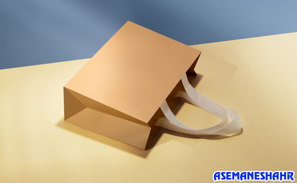کیف هدیه لوکس کرم با دسته روبانی سفید | مناسب بسته‌ بندی شیک کادو در مناسبت‌های خاص.