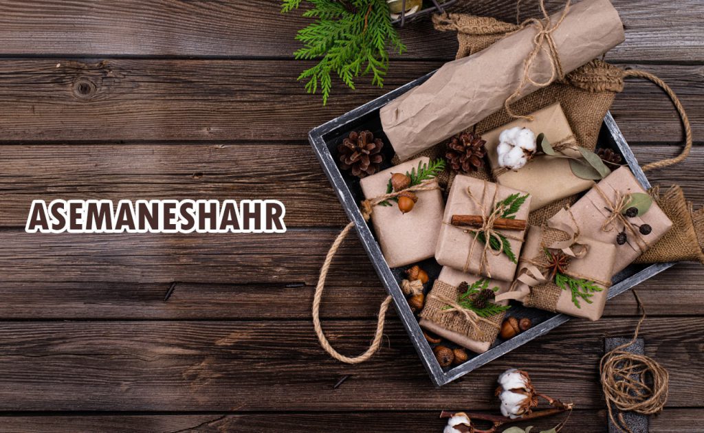 کاغذ کادو گلاسه طرح برگ مدرن کد 114، با نقوش برگی در رنگ‌های صورتی و سبز براق، مناسب برای بسته‌بندی شیک و خلاقانه‌ هدایا.