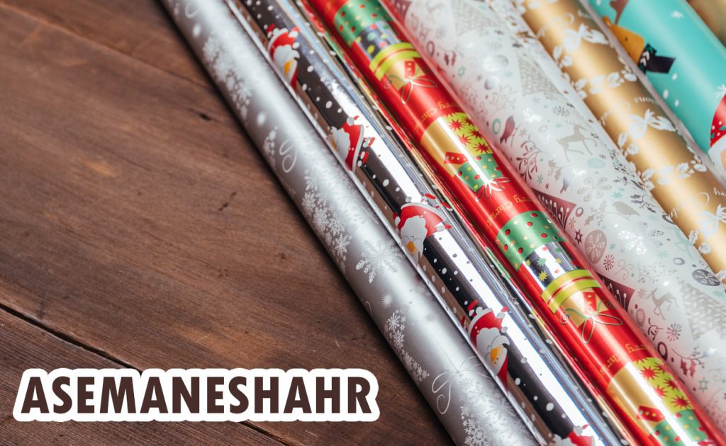 بسته بندی هدیه با کاغذ کادو گلاسه در طرح های لوکس و رنگارنگ