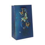 ساک دستی آبی با طرح پروانه طلایی و نقوش زیبا.