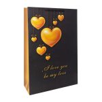 ساک دستی کاغذی با طرح قلب طلایی و پیام عاشقانه ‘I love you’