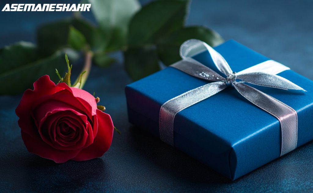 جعبه هدیه آبی شیک همراه گل رز قرمز روی زمینه تیره.
